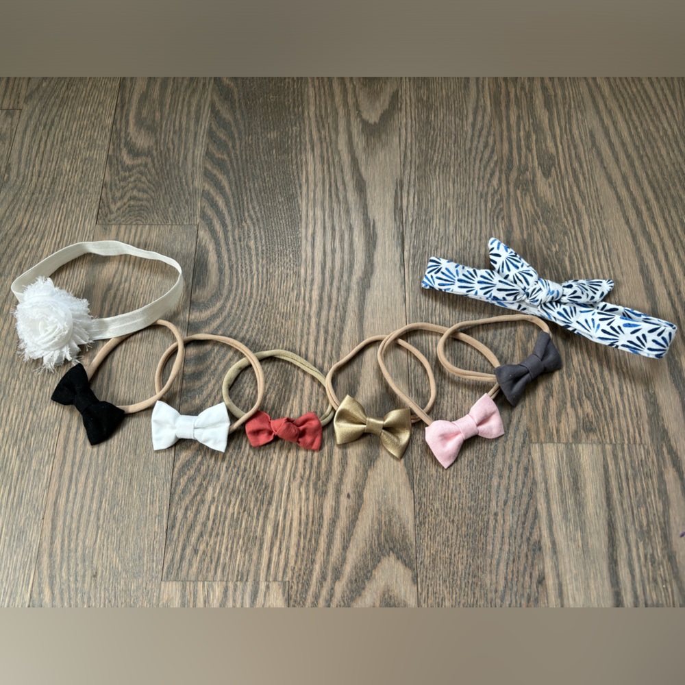 Eight adjustable baby headbands